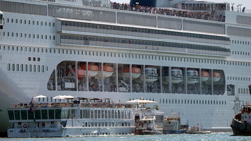 At least 5 injured after giant cruise ship hits tour boat and dock in Venice